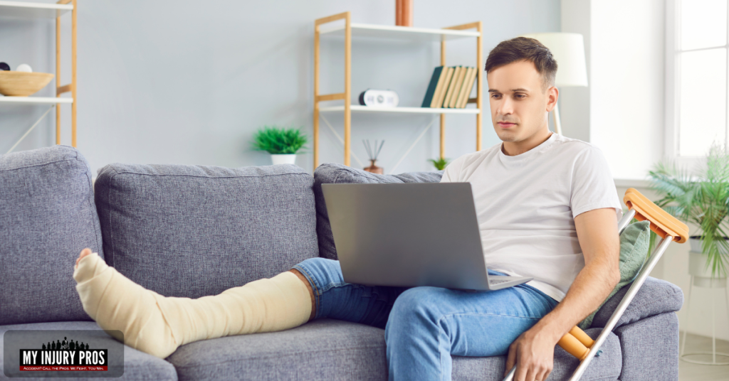 Injured homeowner sitting at home with medical bills, illustrating Does Homeowners Insurance Cover Personal Injury To The Homeowner.