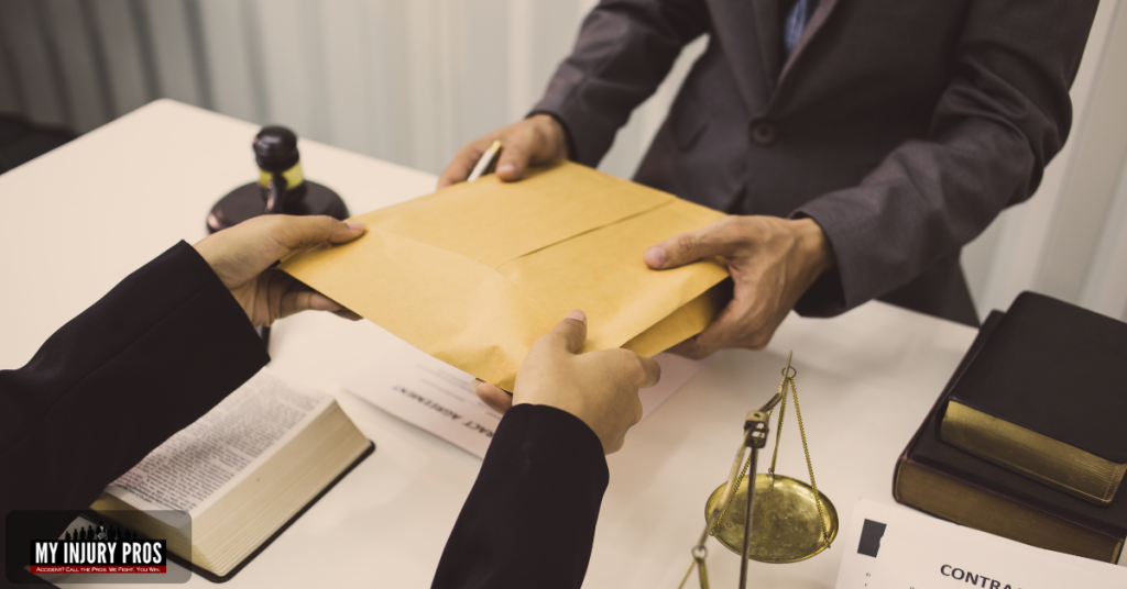 Lawyer examining evidence to determine who is liable in a personal injury case.