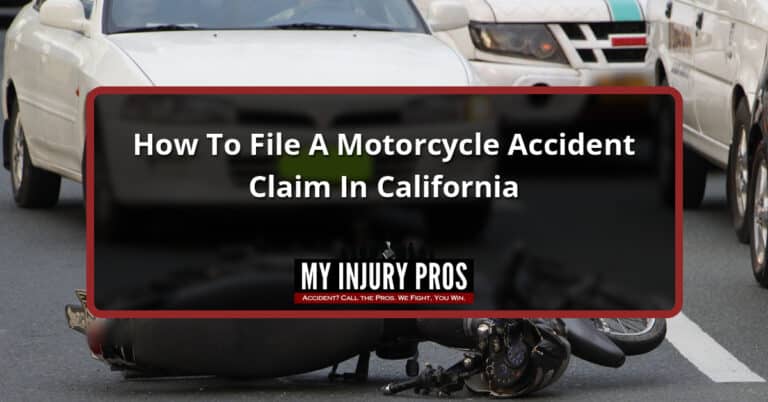 Motorcycle lying on its side in a traffic lane with a helmet on the asphalt and stopped cars behind, with the title How To File A Motorcycle Accident Claim In California