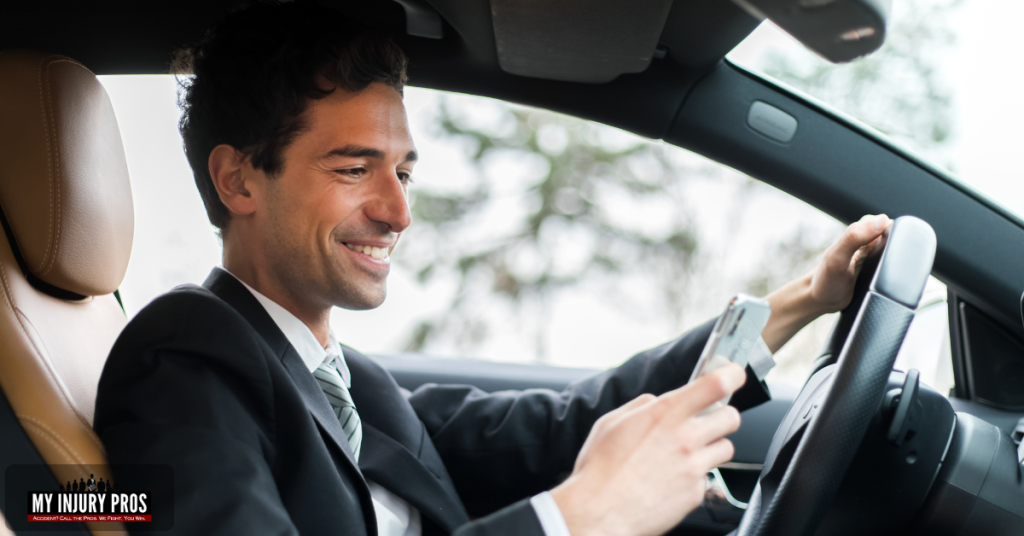 Distracted driver using phone showing leading cause of injuries in traffic collisions California