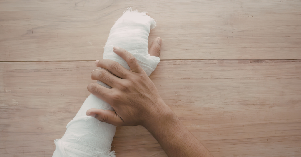 Person taking photos of a dog bite injury for legal evidence