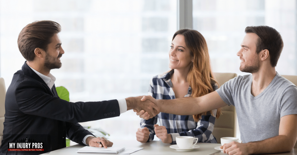 How much is a personal injury case worth experienced attorney meeting with clients and discussing a fair settlement